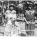 Ojibwe women wearing jingle dresses